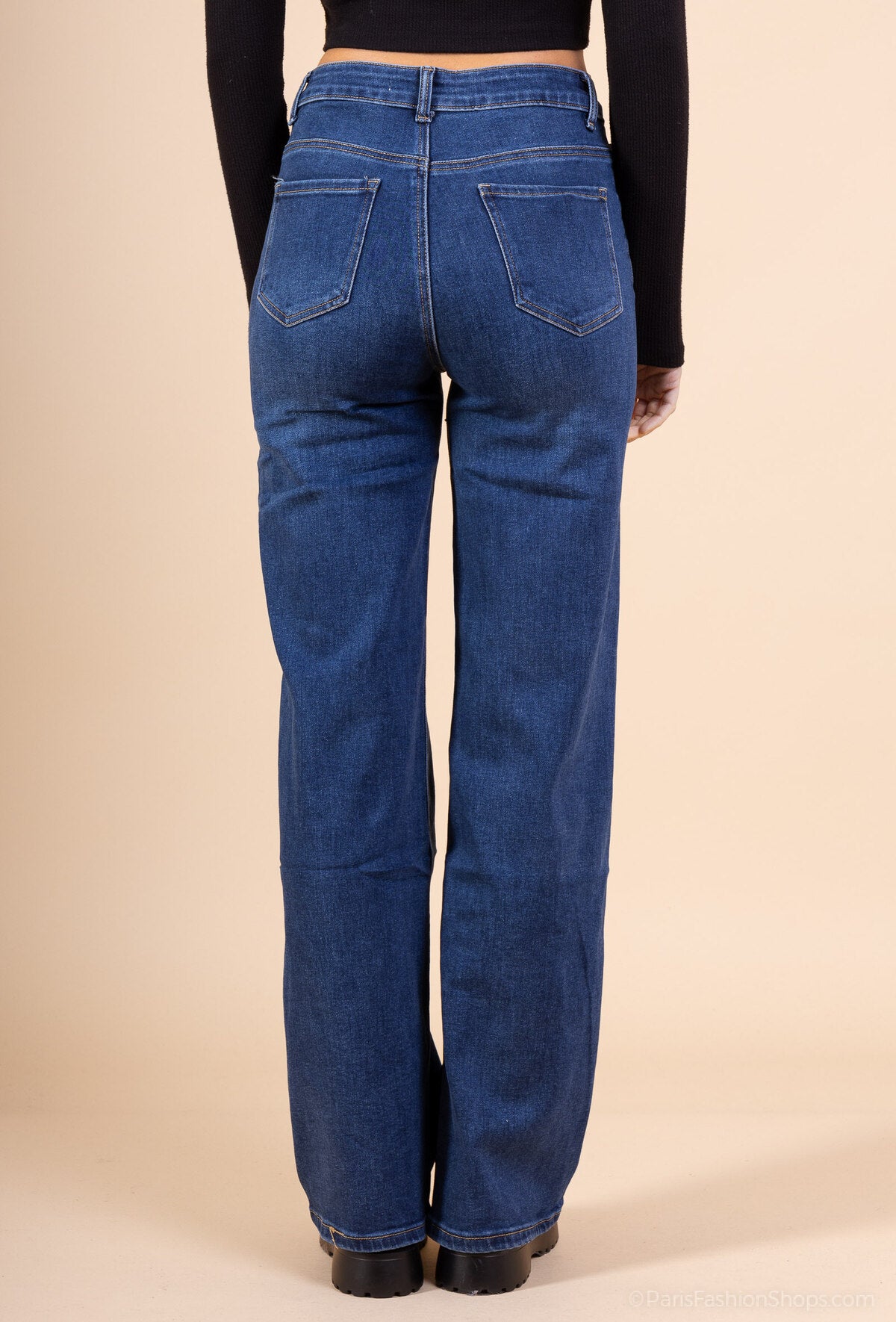 Jeans bouton décalé