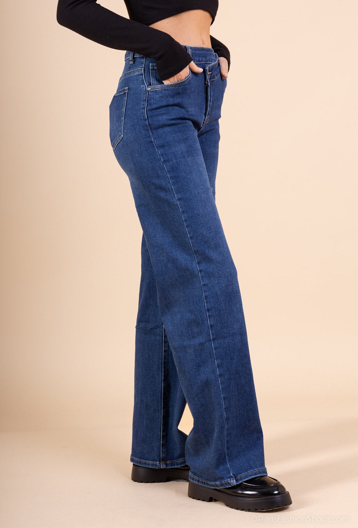 Jeans bouton décalé